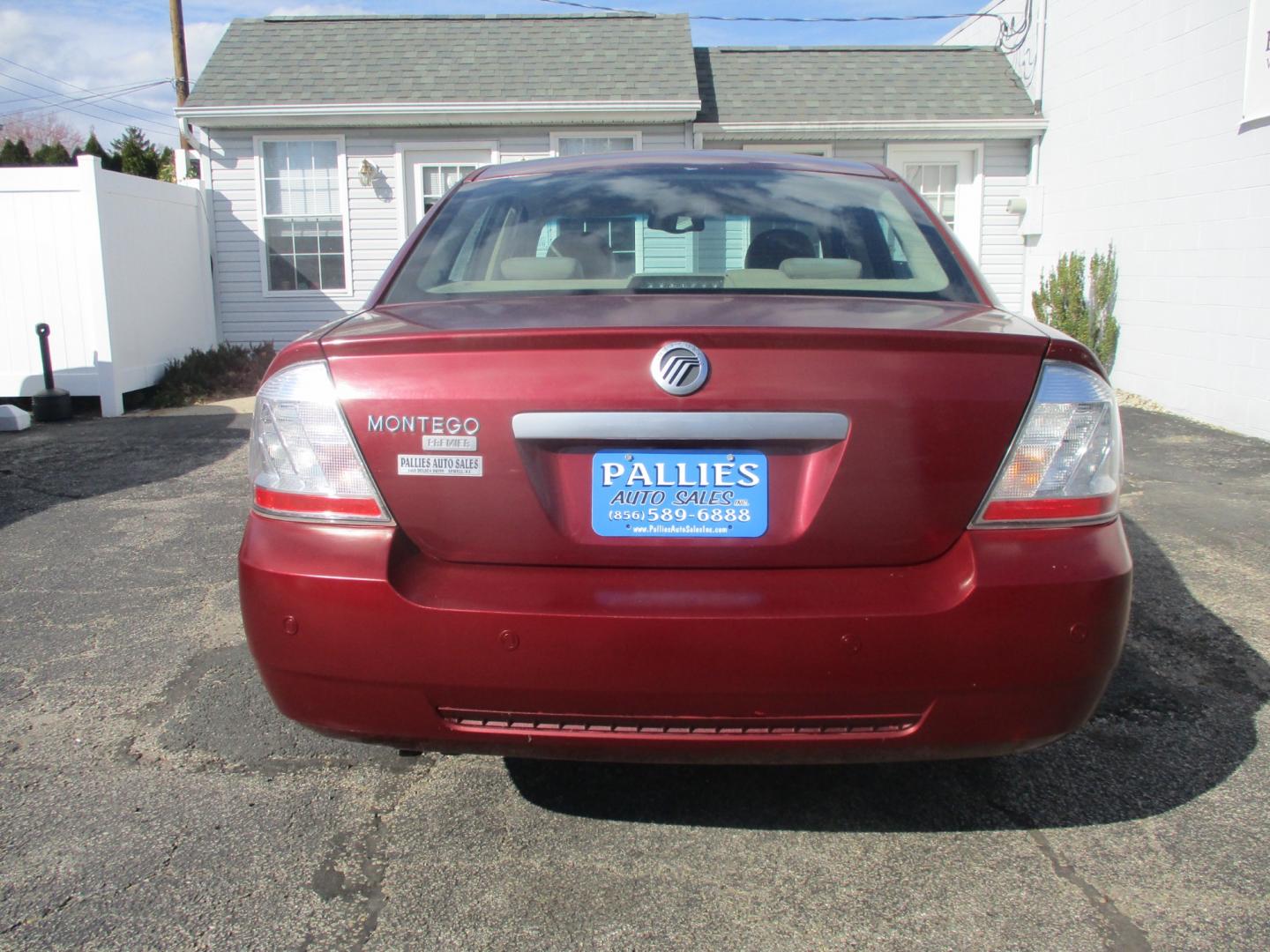 2005 RED Mercury Montego (1MEFM421X5G) with an 3.0L L4 DOHC 16V engine, AUTOMATIC transmission, located at 540a Delsea Drive, Sewell, NJ, 08080, (856) 589-6888, 39.752560, -75.111206 - Photo#4